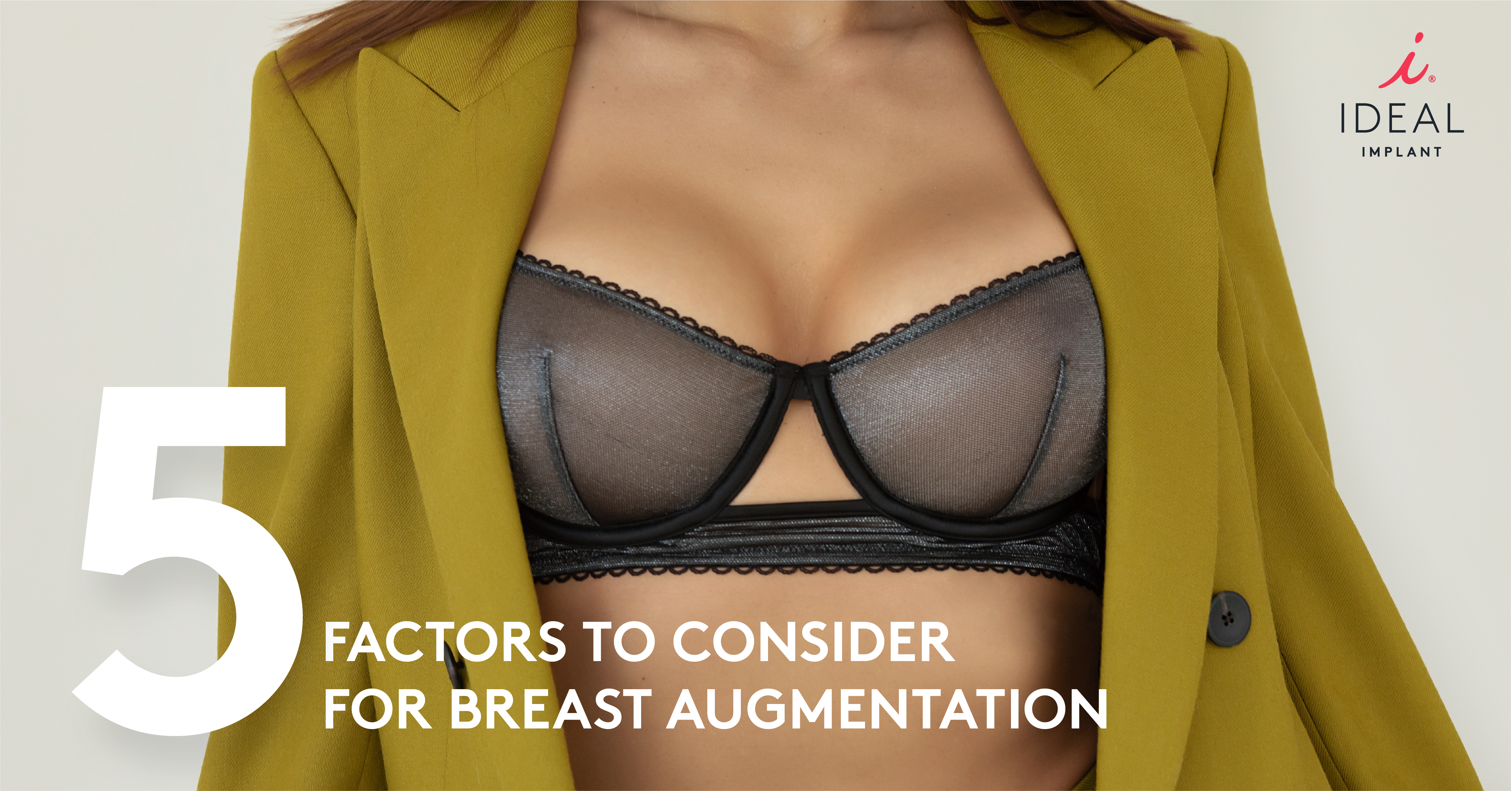 Close-up of Woman's Chest Wearing a Bra and Jacket - 5 Factors to Consider for Breast Augmentation